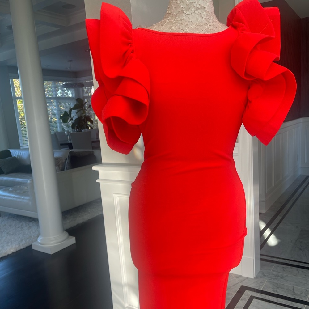 No brand. Great dress for photos /interview